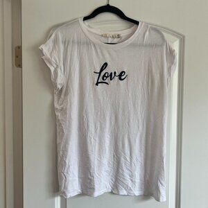 Christian Siriano NY white tank with "Love" in black felt